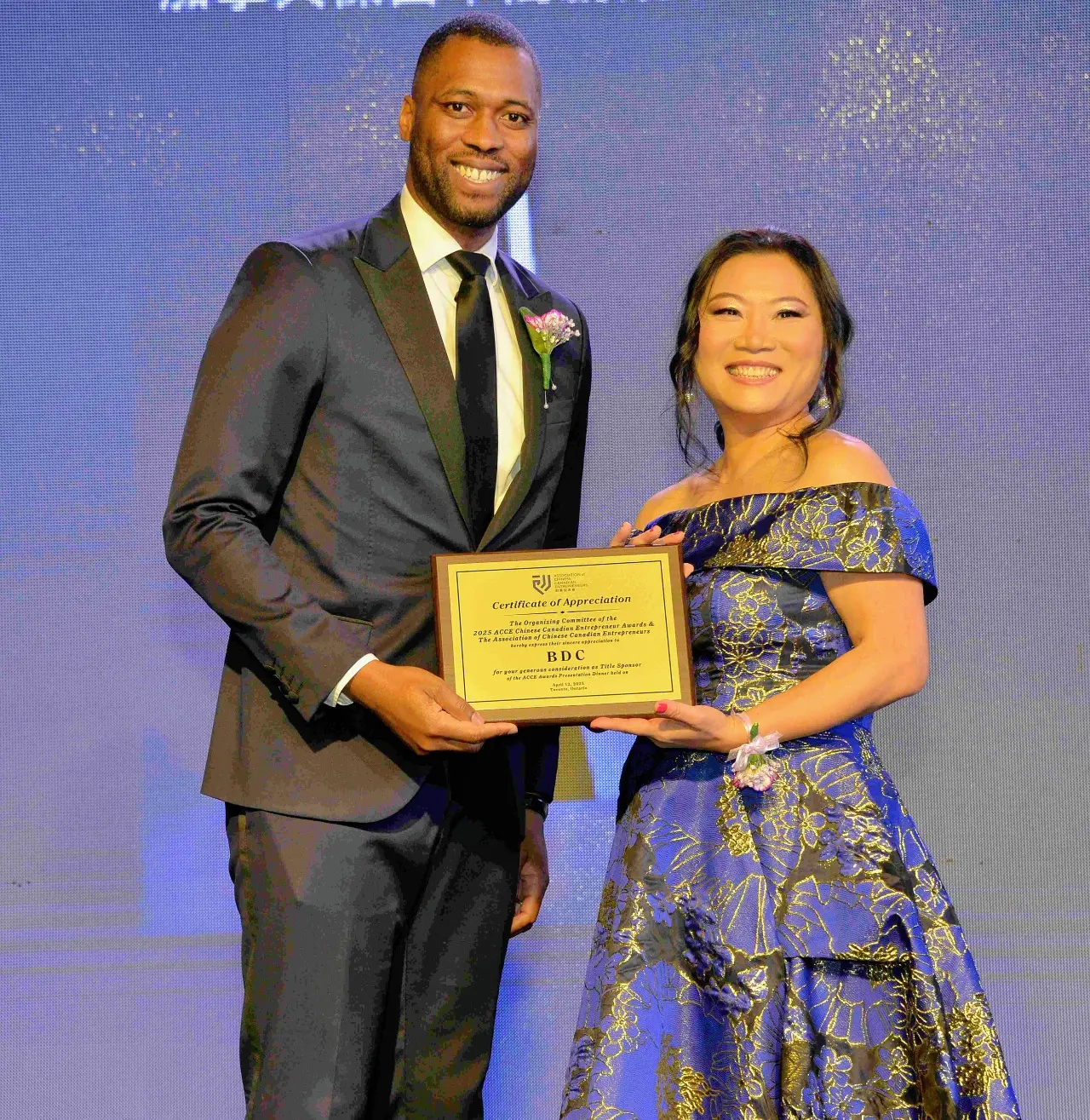 ACCE_Award_28th_gala_award_president_Yvonne_Chan_presented_appreciation_plaque_to_title_sponsor_BDC_rep._Tyson_Jones