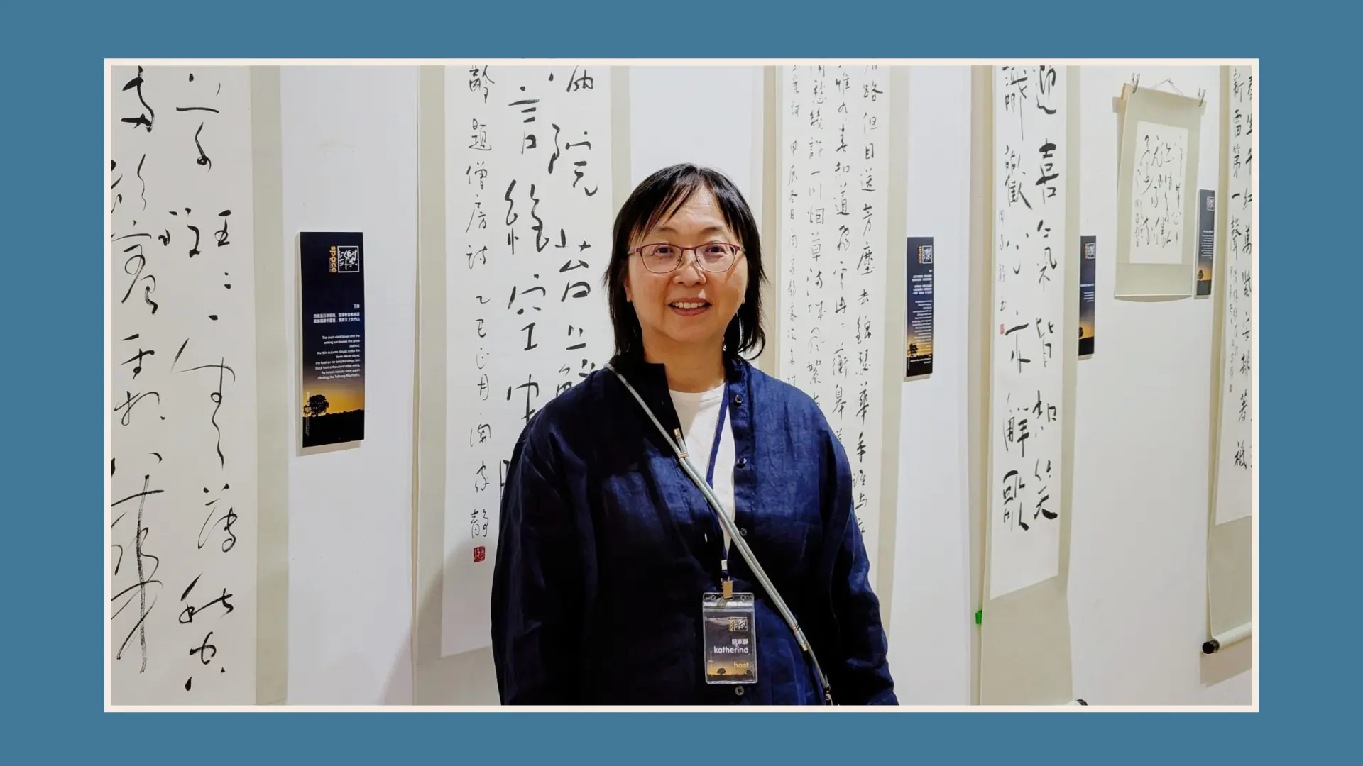 Katherina_Kwan_Beyond_Space_&_Time_exhibition_2025_Katherina_Kwan_in_front_of her_artwork