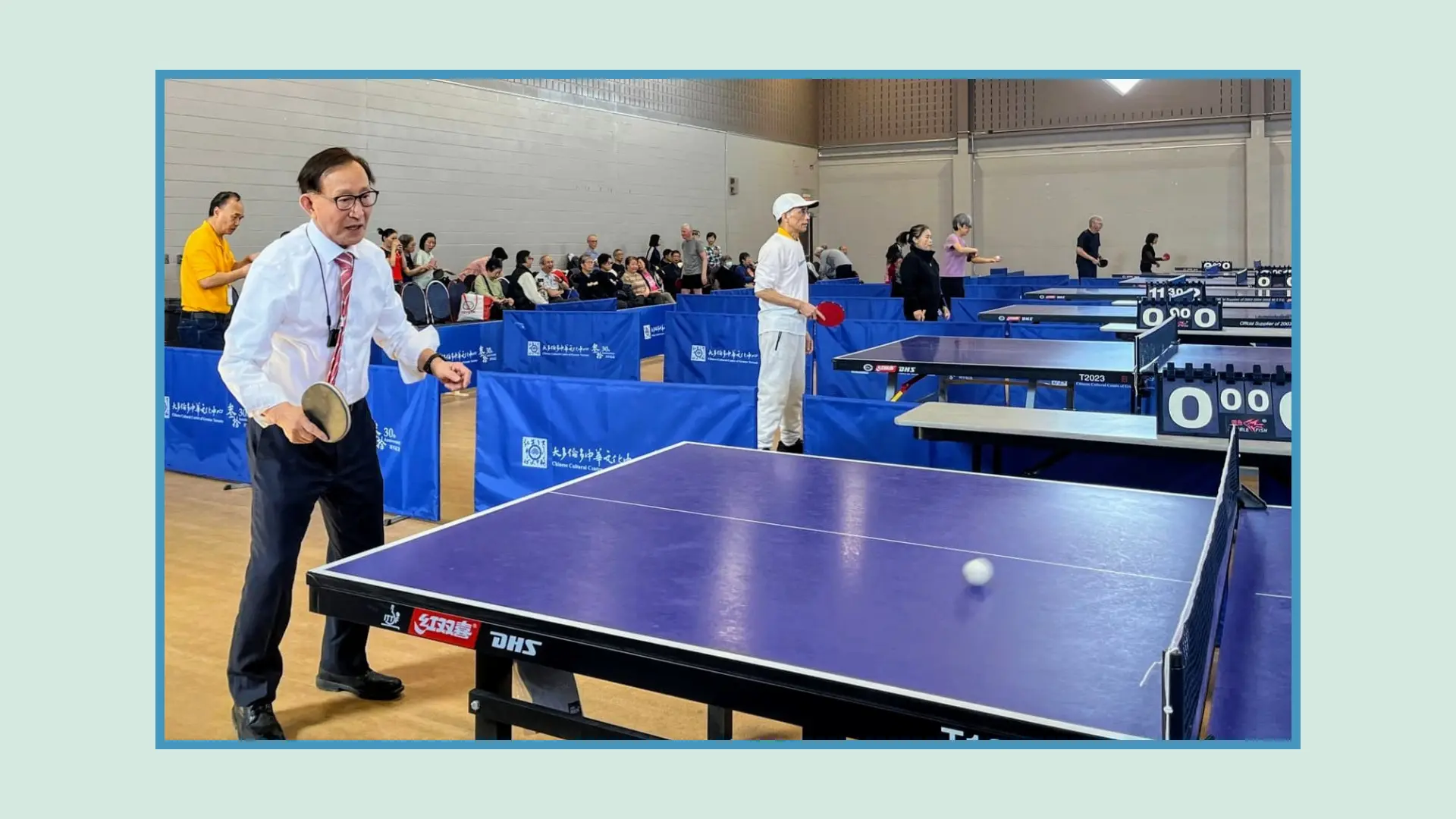 Raymond_Cho_playing_ping_pong_in_the_centre